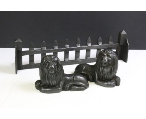 Pair of Cast Iron ' Lion ' Fire Dogs, each 20cm long together with a Cast Iron Fire Grate Front