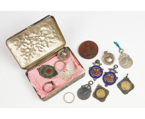 A small group of mixed collectables contained within an antique trinket box to include silver watch fobs and silver jewellery