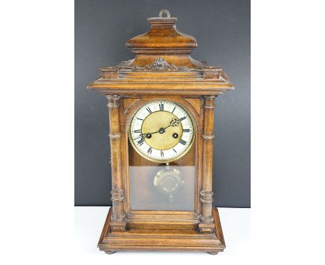 Early 20th century Vienna style wooden cased mantle clock, with glazed door, pendulum &amp; key. (Measures approx 49cm high) 