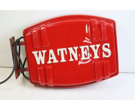 Watneys advertising wall mounted light in the form of a barrel with white lettering to the front, and metal wall bracket. Mea