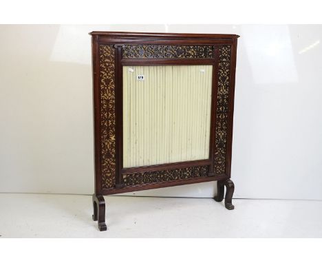 Early 20th century Mahogany Firescreen, with glazed pleated fabric centre surrounded by a fretwork panels, 78cm wide x 95cm h