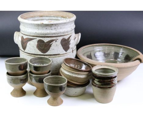 Studio art pottery punch set to include five goblets, punch bowl and ladle, four bowls, twin handled pot and one small pot. I