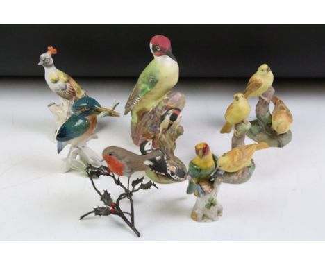 Eight ceramic bird figures to include 4 x Royal Worcester examples (2 x 3377 Yellow Hammers, 3363 Pied Woodpeckers, 3249 Wood