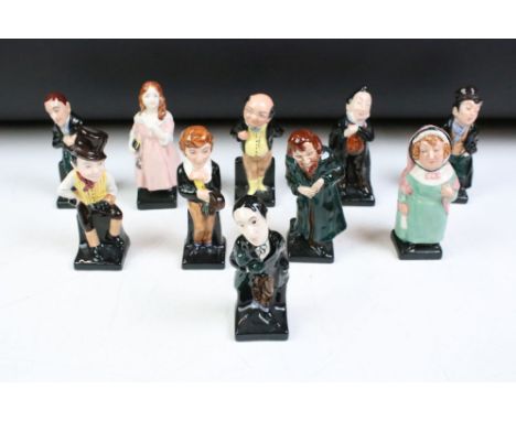 Group of Royal Doulton Dickens character ceramic figurines to include Sam Weller, Artful Dodger, Pecksniff, Little Nell, Pick