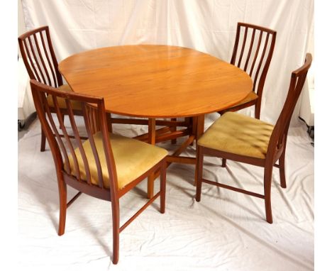 TEAK DROP FLAP DINING TABLEwith shaped flaps supported by a gate leg action, 155cm wide (extended); together with four single