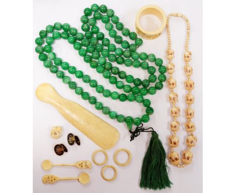 GREEN JADE BEAD NECKLACEapproximately 132cm long; together with a selection of ivory including a carved ivory necklace, a car