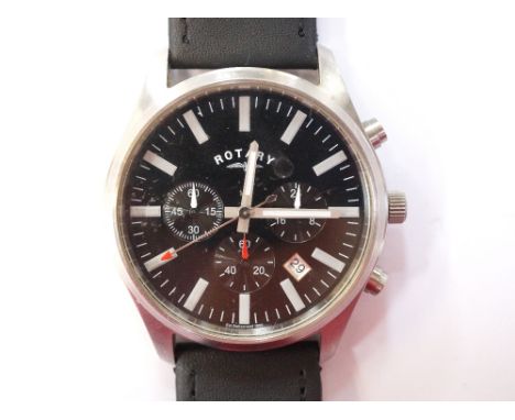 GENTLEMAN'S ROTARY WRISTWATCHwith a circular black dial with baton markers and three subsidiary dials and date aperture, on a