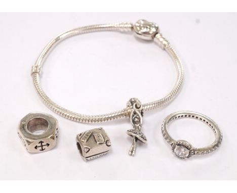 'PANDORA' SILVER BRACELETwith heart clasp and ballerina charm; together with a loose Pandora suitcase charm, a Pandora silver