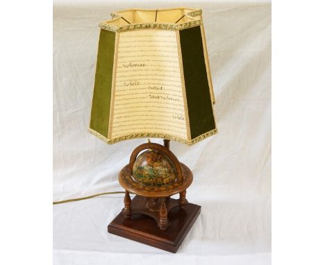 GLOBE TABLE LAMPthe adjustable globe with outer Zodiac ring, raised on turned supports and square wooden base, with shaped br
