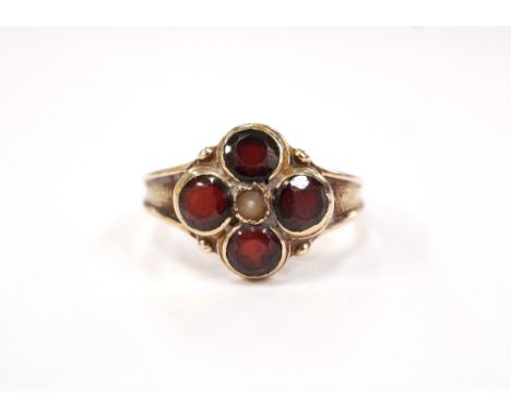 GARNET AND SEED PEARL CLUSTER RINGon nine carat gold shank, ring size O