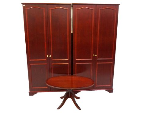 TWO STAG TEAK WARDROBESboth with a pair of panelled doors opening to reveal a shelf and hanging space, 187.5cm high, together