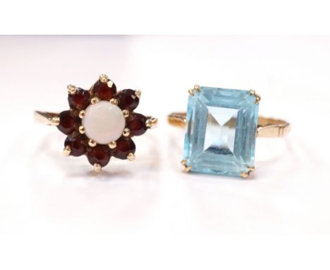 OPAL AND GARNET CLUSTER RINGand a synthetic aquamarine single stone ring, both on nine carat gold shanks, ring sizes M and Q 