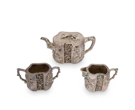 A late 19th / early 20th century Chinese export metalwares three-piece tea set, retailer's mark of Hung Chong &amp; Company, 