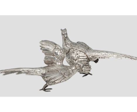 A brace of 20th century silver table ornaments modelled as pheasants, mark of Israel Freeman &amp; Son Ltd., London 1968, the