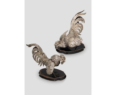 A brace of early 20th century German metalwares silver table ornaments modelled as fighting cocks, mark of Wilhelm Weinranck,