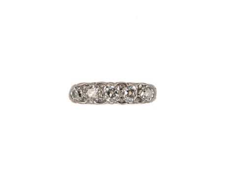 A Victorian diamond set carved half hoop ring, five graduated old mine cut diamonds, central stone approximately 4.1 x 4 x 3m