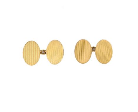 A pair of 18ct gold early 20th century cufflinks, Oval shaped with an engine turned grooved pattern, dimensions 2 x 1.4cm, ch
