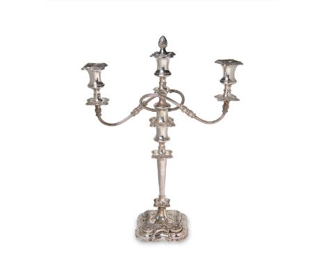 An Elizabeth II silver three light metamorphic candelabra, mark not traced (GE), Sheffield 1956, loaded square base with roun