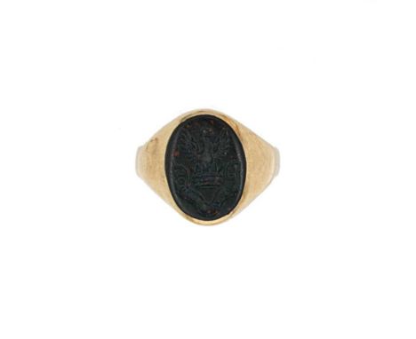 A bloodstone signet ring, oval shaped bloodstone intaglio engraved with a crest, head dimensions 14.2 x 11mm, size K, unhallm