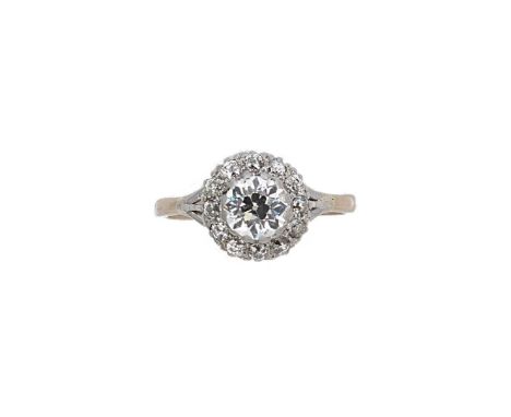 An early 20th century diamond cluster ring, claw set old European cut diamond, approximate diameter 6.45 x 6.4mm, depth 4mm, 