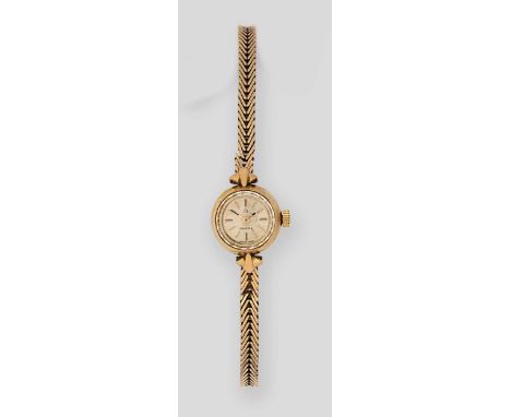 Omega - A 9ct gold wristwatch, circa 1963, model number BL7115714, serial number 20483138, circular silvered dial with gold c