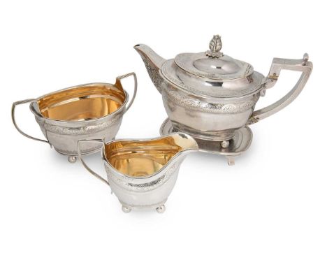 Edinburgh - A George III silver four piece tea set, mark of Robert Gray &amp; Son, 1809, the teapot of oval form, upper with 
