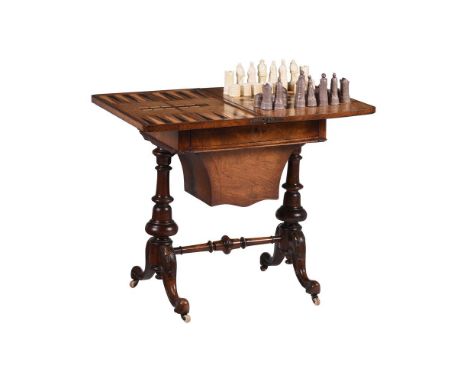 A VICTORIAN WALNUT GAMES TABLECIRCA 1870With chess, cribbage and backgammon75cm high, 59cm wide, 42cm deepCondition Report: M