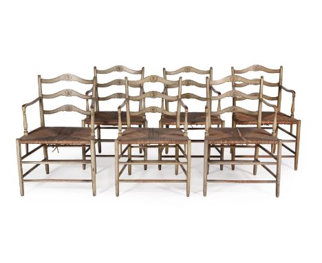 A SET OF SIX REGENCY PAINTED LADDER BACK ARMCHAIRSCIRCA 1815Each with a rush seat and decorated 'en grisaille'88cm high, 58cm