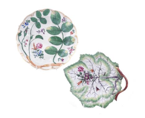 A WORCESTER 'BLIND EARL' PLATE CIRCA 1770 23.5cm diameter AND A WORCESTER LEAF-SHAPED DISH, circa 1770, 23.5cm in length  Con