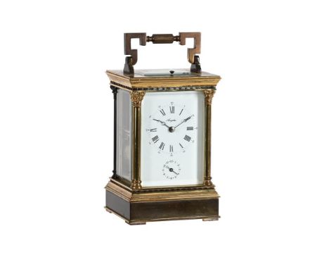 A BRASS BUSH BUTTON REPEATING CARRIAGE CLOCKLATE 20TH CENTURYThe eight-day movement with platform lever escapement and push b