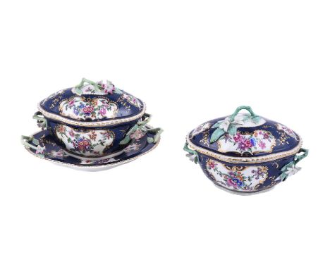 TWO WORCESTER OVAL BLUE-SCALE GROUND SAUCE TUREENS, COVERS AND A STANDCIRCA 1770Painted with panels of flowers, the tureens a