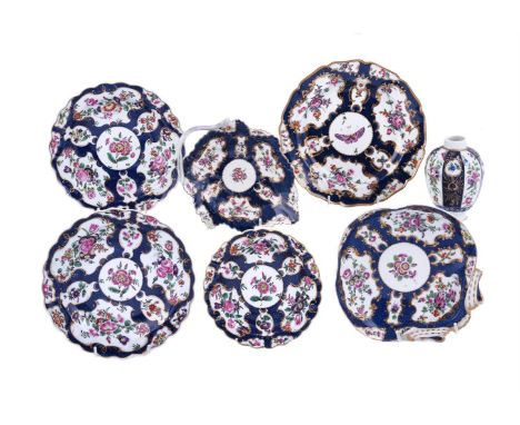 A SELECTION OF WORCESTER BLUE-SCALE GROUND PORCELAINCIRCA 1770Painted with panels of flowers, comprising: a tea cannister, 12