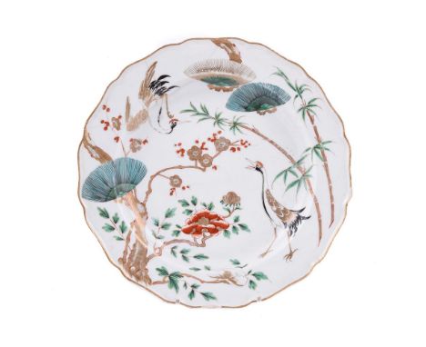 A WORCESTER ARITA STYLE PLATE PAINTED AND GILT WITH CRANES AND FLOWERING PRUNUS CIRCA 1770 Un-marked, 22.5cm diameterCf. Sper