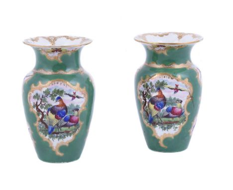 A PAIR OF WORCESTER APPLE-GREEN SHOULDERED VASESTHE PORCELAIN CIRCA 1770Painted with panels of exotic birds, 12.5cm highCf. B