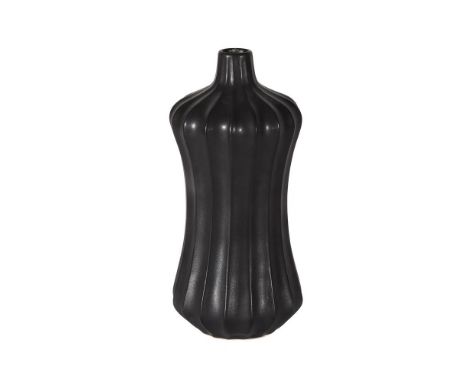 A JONATHAN ADLER MODERN BLACK GLAZED CERAMIC VASEOf waisted fluted formJonathan Adler marks to the underside24cm highProvenan