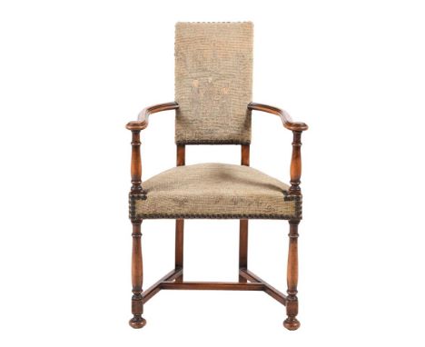 A WALNUT AND TAPESTRY UPHOLSTERED OPEN ARMCHAIREARLY 20TH CENTURY Of triangular section95cm high
