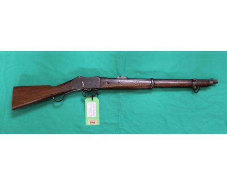 A Martini Henry .577/450 carbine lock marked L.S.A. 1875 IIz, stock also marked with Enfield roundel and IIz, an honest examp