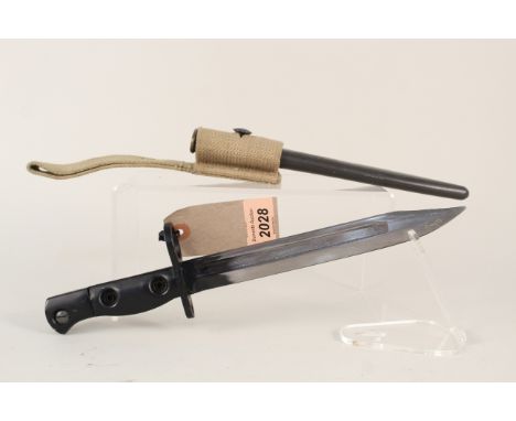 A British No.5/Stirling S.M.G. bayonet with scabbard and webbing frog marked 1964 and blade marked Stirling