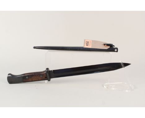 A Third Reich era 84/98 knife bayonet dated 1944 with a 1943 dated scabbard, a very good example with wooden grips