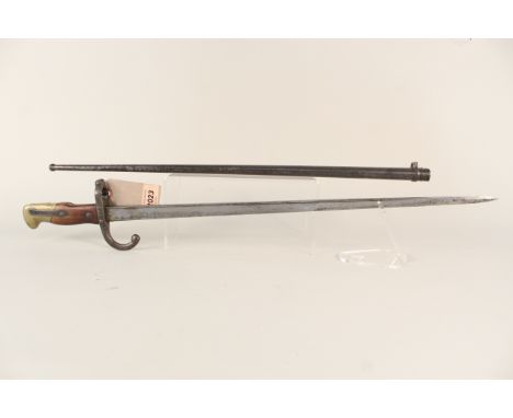A French model 1874 bayonet with scabbard, blade dated 1877