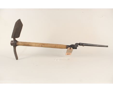 A British WWII era entrenching tool (dated 1944) with end of shaft having a detachable No.4 Mk II spike bayonet and scabbard