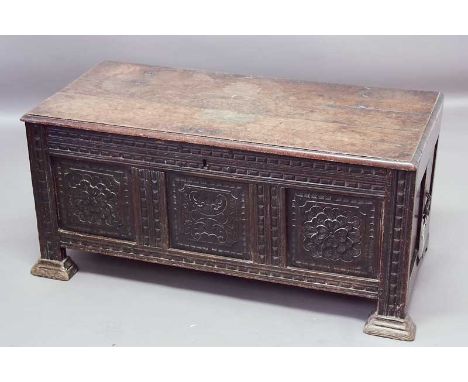 A 17TH CENTURY OAK COFFER with carved panel front 46" (117cm)