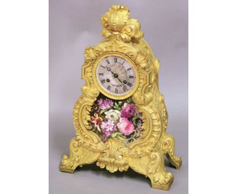 A FRENCH MANTEL CLOCK the movement striking on a bell and with silvered dial inscribed Guyerdet Aine a Paris above a porcelai