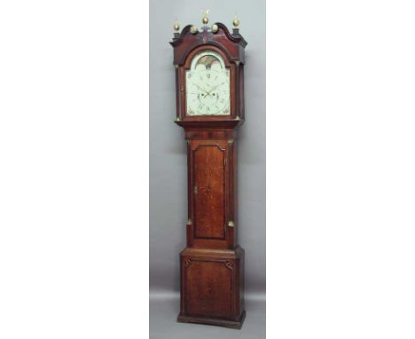 A LONGCASE CLOCK the striking movement with anchor escapement, subsidiary seconds dial, date and moon phase indicators.  Pain