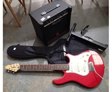 Peavey electric guitar, amplifier, guitar stand and assorted cables