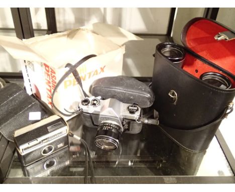 Pentax camera, Kodak camera and a pair of Prinz binoculars