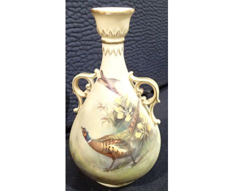 Royal Worcester twin handled Pheasant vase CONDITION REPORT: Some restoration to the neck otherwise appears in fair/good cond