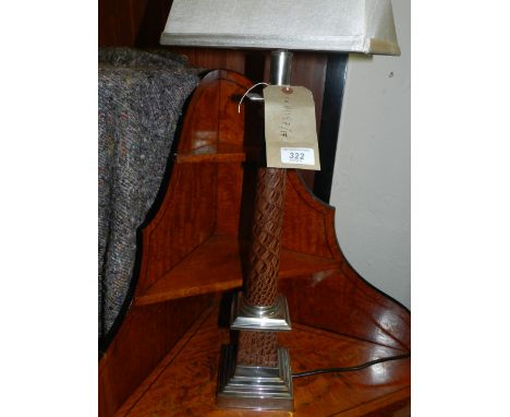 A silver plated and simulated crocodile skin column table lamp.