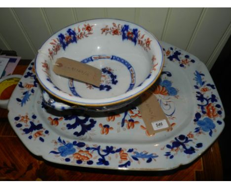 A late 19th century Staffordshire pottery octagonal meat plate decorated in the imari palate, together with a twin-handled pe