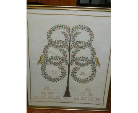 A 20th century needle work sampler, stylised as a tree with songbirds, bears verse. H.60cm W.49cm